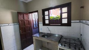 Casa 3 Quartos com garagem e churrasqueira