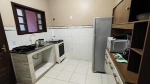 Casa 3 Quartos com garagem e churrasqueira