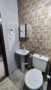 Casa 3 Quartos com garagem e churrasqueira