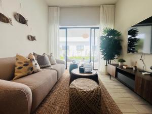 Private picuzzi in a NEW condo with private beach