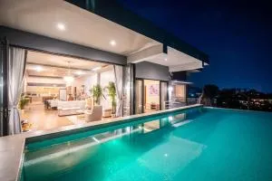 泰国普吉岛查龙海滩海景度4卧室E2免费女拥每日清洁Ins无边泳池24小时服务提供早餐午餐晚餐 - Ban Klang