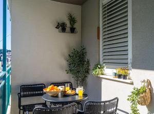 Modern City Escape with Balcony - Near the Ferry Port