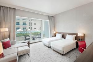 Twin Room with Sofa Bed and Pool View - Free Breakfast,  Complimentary Transfer to Deira City Center, Outlet Mall room in Hyatt Place Dubai Al Rigga