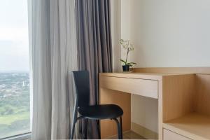 Gala by TwoSpaces Studio at TreePark Apartment