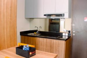 1BR Japanese Style Apartment at Mustika Golf Residence By Travelio