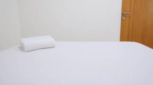 Spacious and Best Deal 2BR Apartment at Puncak Bukit Golf Surabaya By Travelio