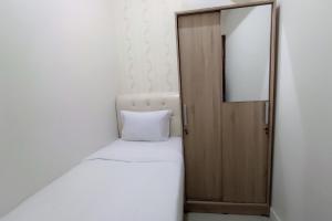 Simply and Clean 2BR Apartment at Vida View Makassar By Travelio