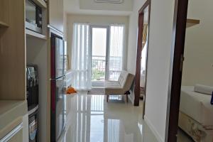 Simply and Clean 2BR Apartment at Vida View Makassar By Travelio