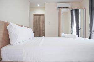 Nice and Comfort 2BR at Pejaten Park Apartment By Travelio