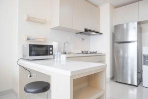 Nice and Comfort 2BR at Pejaten Park Apartment By Travelio
