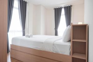 Nice and Comfort 2BR at Pejaten Park Apartment By Travelio