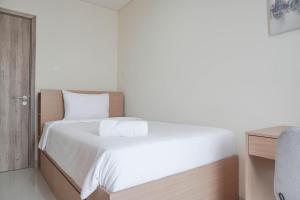 Nice and Comfort 2BR at Pejaten Park Apartment By Travelio
