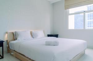 Fancy and Nice 1BR Apartment at Silkwood Residence By Travelio