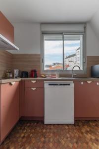 Appartements L-Alquie - Appartement design hyper centre : photos des chambres