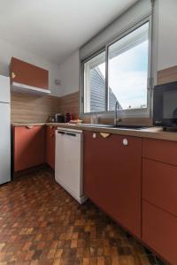 Appartements L-Alquie - Appartement design hyper centre : photos des chambres