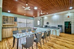 SaffronStays Six Oaks - 6BR Lakeside Villa with Pool, Games Room & Backwater Views