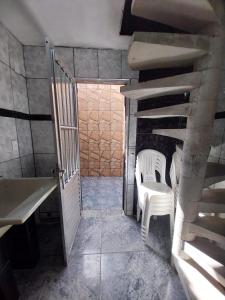 Casa com piscina, churrasqueira e forno a lenha