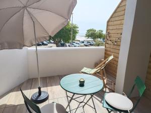 Appartements La Terrasse, studio vue mer : photos des chambres