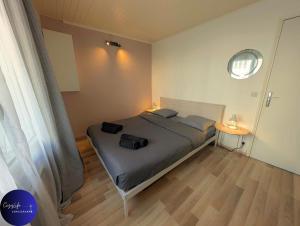 Maisons de vacances Le Jardin d-Angely by CozyLife Central Jardin : photos des chambres