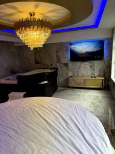 Appartements Golden house 2 - Jacuzzi : photos des chambres