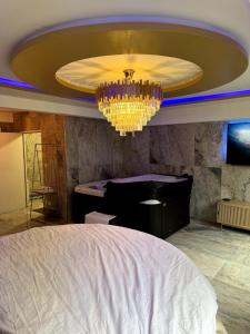 Appartements Golden house 2 - Jacuzzi : photos des chambres