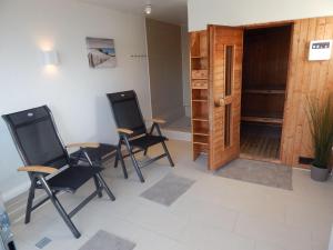 Risel-Ferienhaus-im-Huus-Godewind-mit-Sauna-und-Kamin