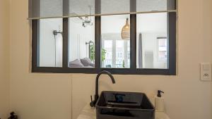 Appartements Le Reflet Secret - Hypercentre - Balneo : photos des chambres