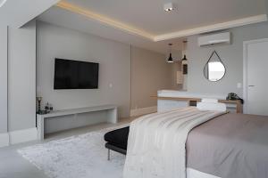Apartamento com vaga de garagem e supermercado