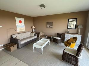 Vue sur mer, dunes et golf