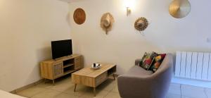 Appartements Le Bacchus : photos des chambres