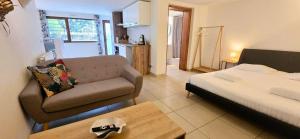 Appartements Le Bacchus : photos des chambres