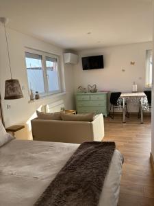 Appartements Les petites plumes d’Hag : photos des chambres