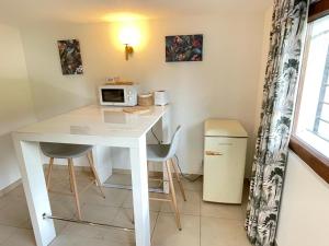 Appartements Le Bacchus : photos des chambres