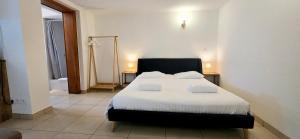 Appartements Le Bacchus : photos des chambres