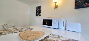 Appartements Le Bacchus : photos des chambres