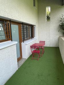 Appartements Le Bacchus : photos des chambres