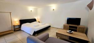Appartements Le Bacchus : photos des chambres