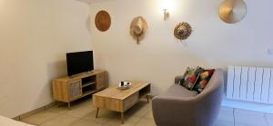 Appartements Le Bacchus : photos des chambres