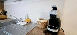 Appartements Le Bacchus : photos des chambres