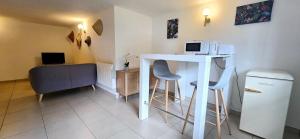 Appartements Le Bacchus : photos des chambres