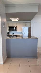 Breathtaking Direct Bay Views 2 bedroom condo with parking