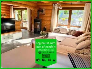 Blockhaus Malmkrog with garden, bright rooms, and an open kitchen - Copşa Mare