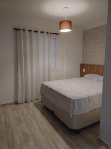 Apartamento na maior praia do Guarujá Região Tortuga
