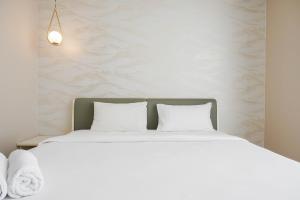 Elegant 2BR Ciputra International Apartment near Puri Indah Mall By Travelio