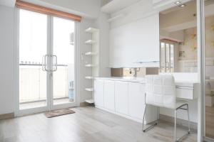 Warm and Comfort Living 1BR at 8th Ambassade Kuningan Apartment By Travelio