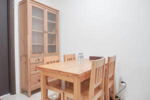 Nice and Elegant 1BR at Lavenue Pancoran Apartment By Travelio