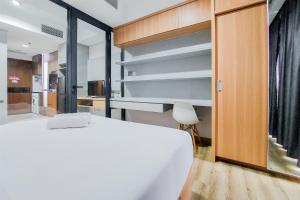 Gorgeous 1BR Apartment at The Smith Alam Sutera By Travelio