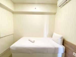 Fully Furnished and Homey 3BR at Meikarta Apartment By Travelio