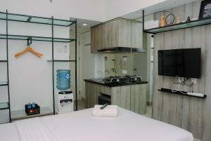 Best and Stylish Studio Unit Springlake Summarecon Apartment By Travelio