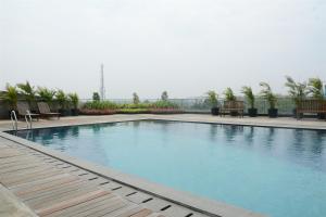 Comfort 2BR at Tree Park City BSD Apartment By Travelio